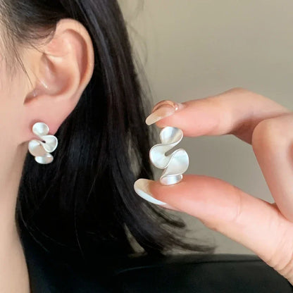 Pendientes de flor de plata y oro 18K