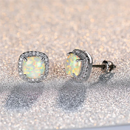 Pendientes elegantes de plata con ópalo de fuego blanco redondo
