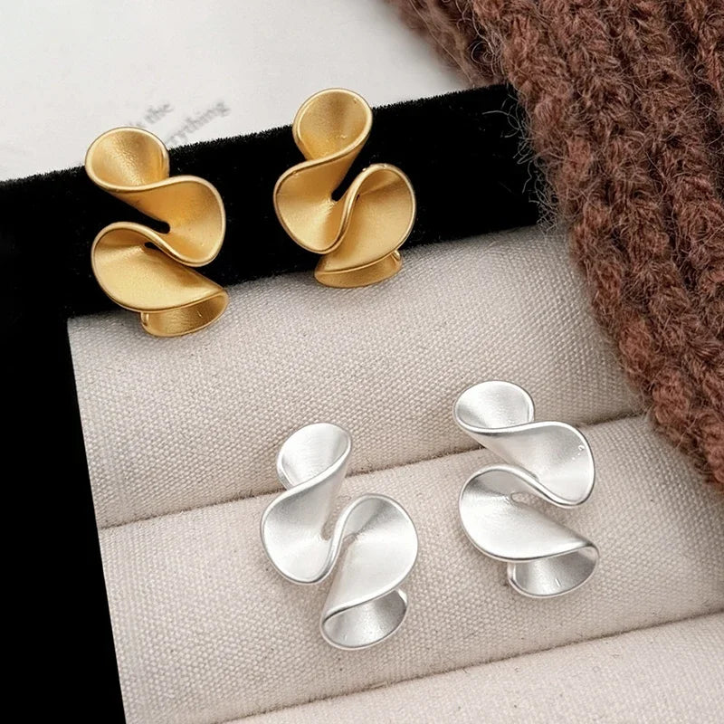 Pendientes de flor de plata y oro 18K