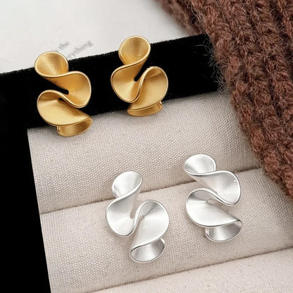 Pendientes de flor de plata y oro 18K