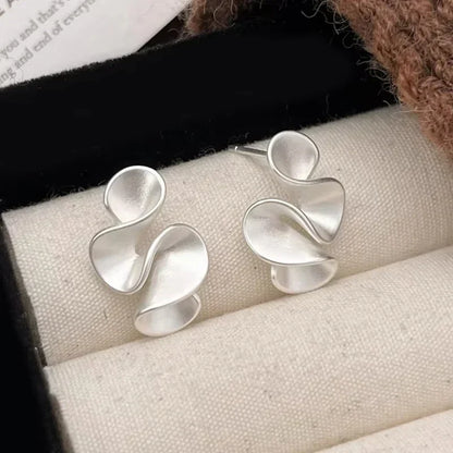 Pendientes de flor de plata y oro 18K