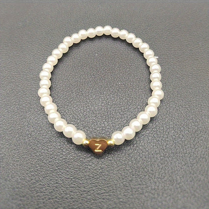 Pulsera chic con inicial de corazón (A–Z)