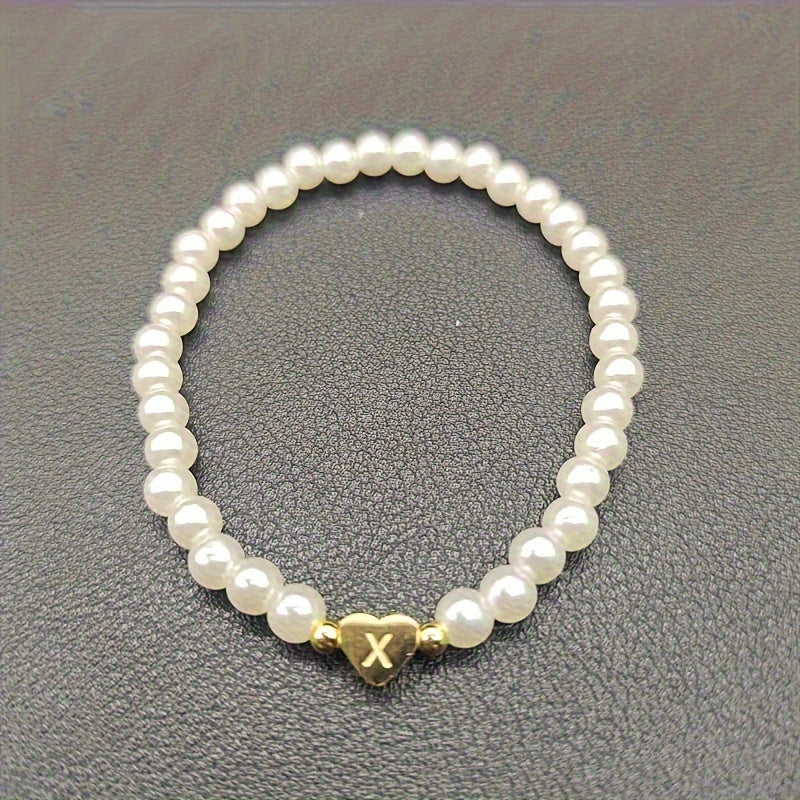 Pulsera chic con inicial de corazón (A–Z)