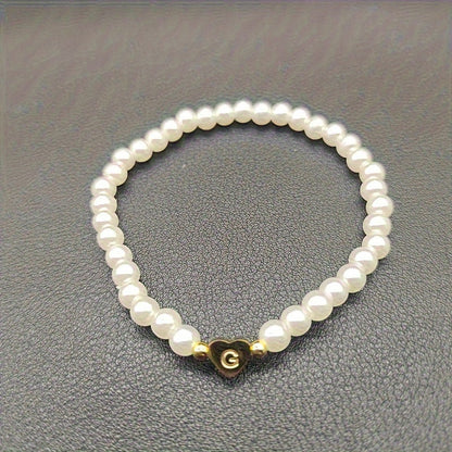 Pulsera chic con inicial de corazón (A–Z)