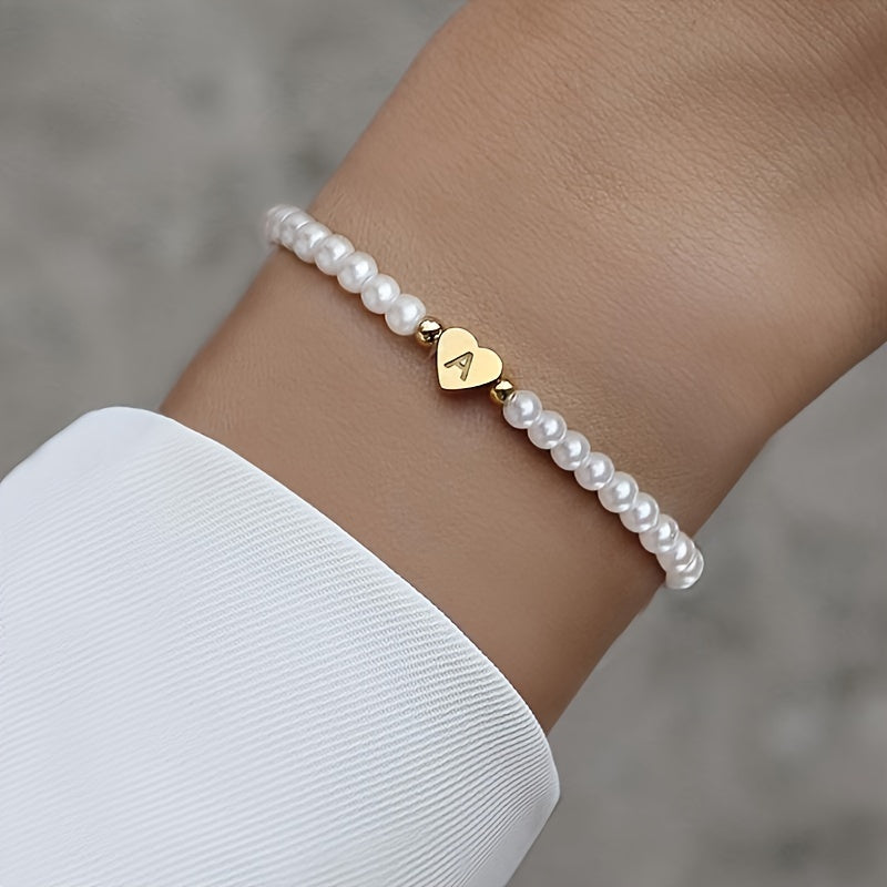 Pulsera chic con inicial de corazón (A–Z)
