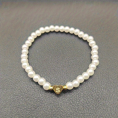 Pulsera chic con inicial de corazón (A–Z)