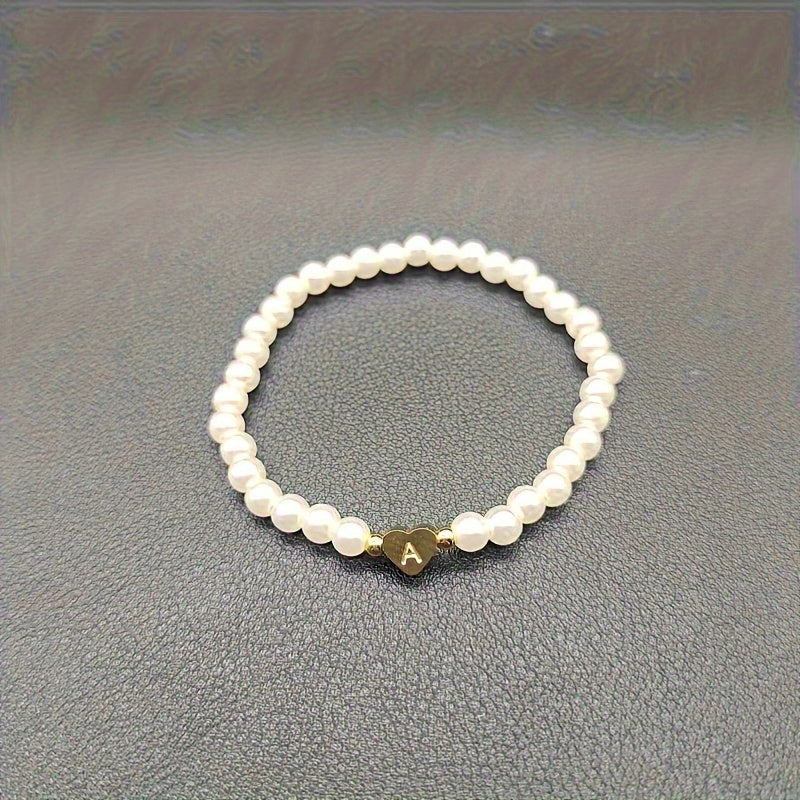 Pulsera chic con inicial de corazón (A–Z)