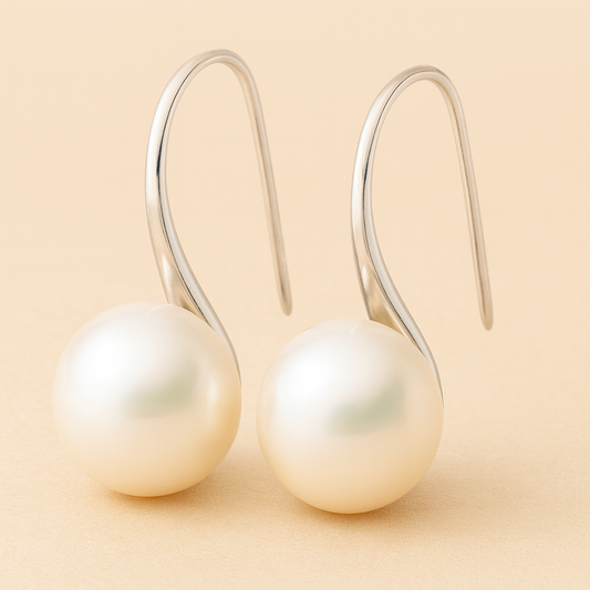 Pendientes elegantes de gota con perlas