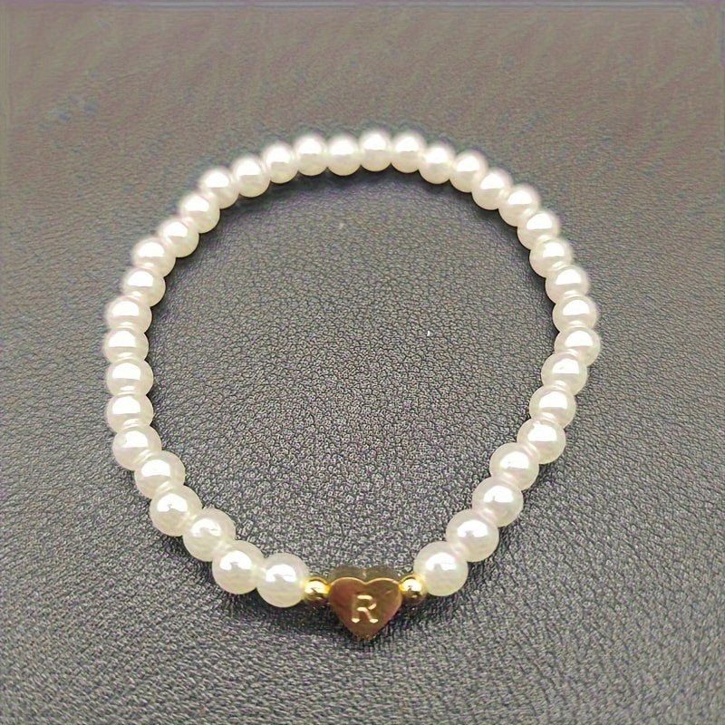 Pulsera chic con inicial de corazón (A–Z)