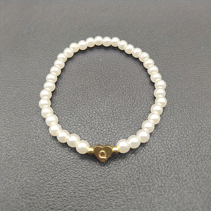 Pulsera chic con inicial de corazón (A–Z)