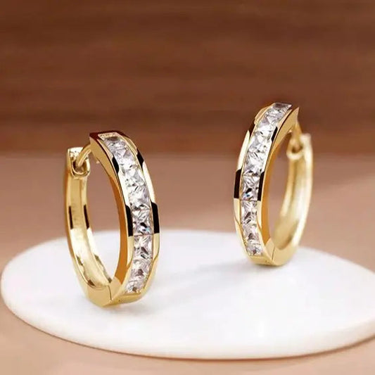 Aros chic de oro y cristal