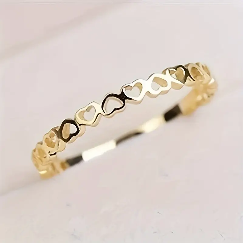Anillo de corazones de oro