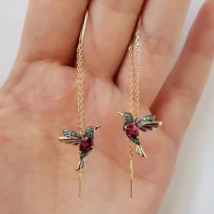Pendientes de hilo con colibrí en oro y cristales