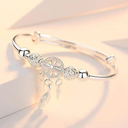 Pulsera con colgante atrapasueños de plata