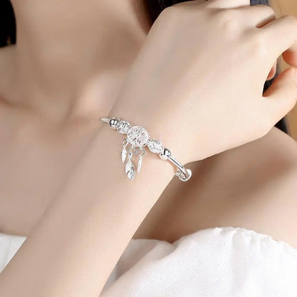 Pulsera de plata con colgante atrapasueños
