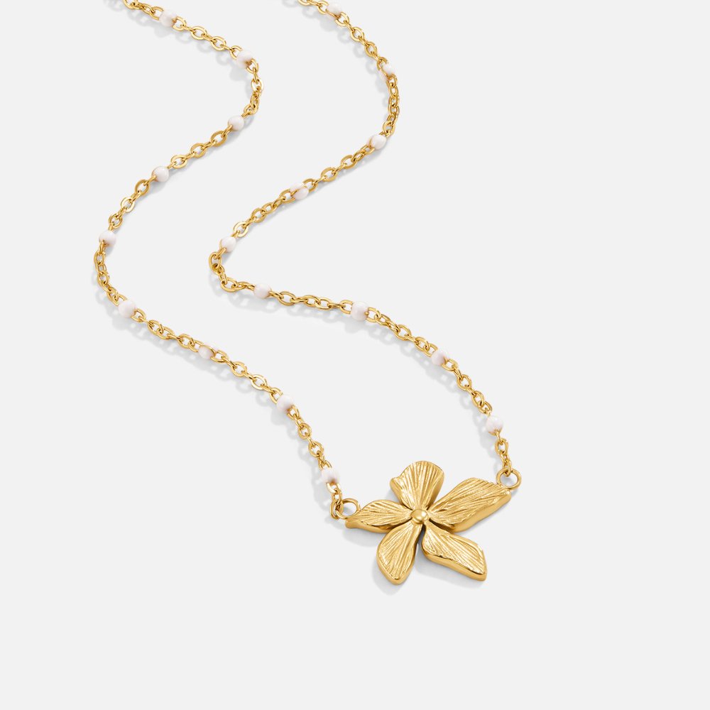 Elegante collar con flor dorada