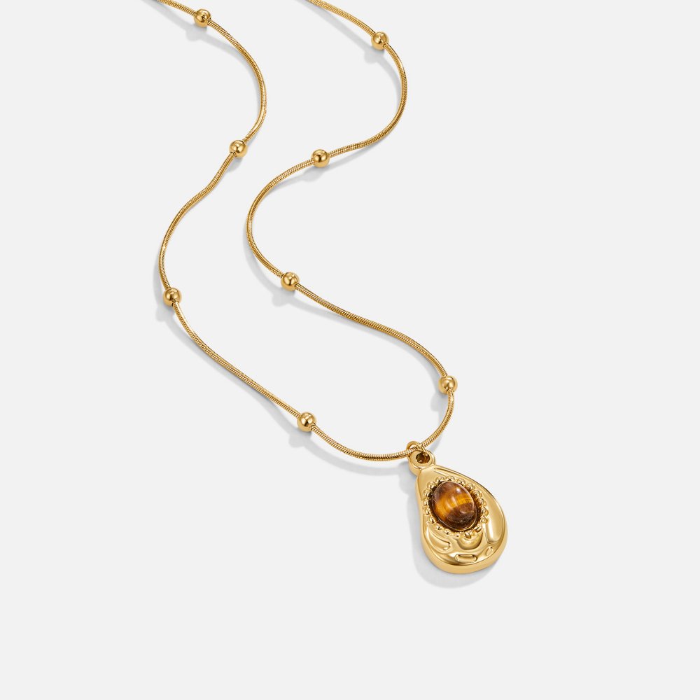 Collar de oro elegante con ojo de tigre